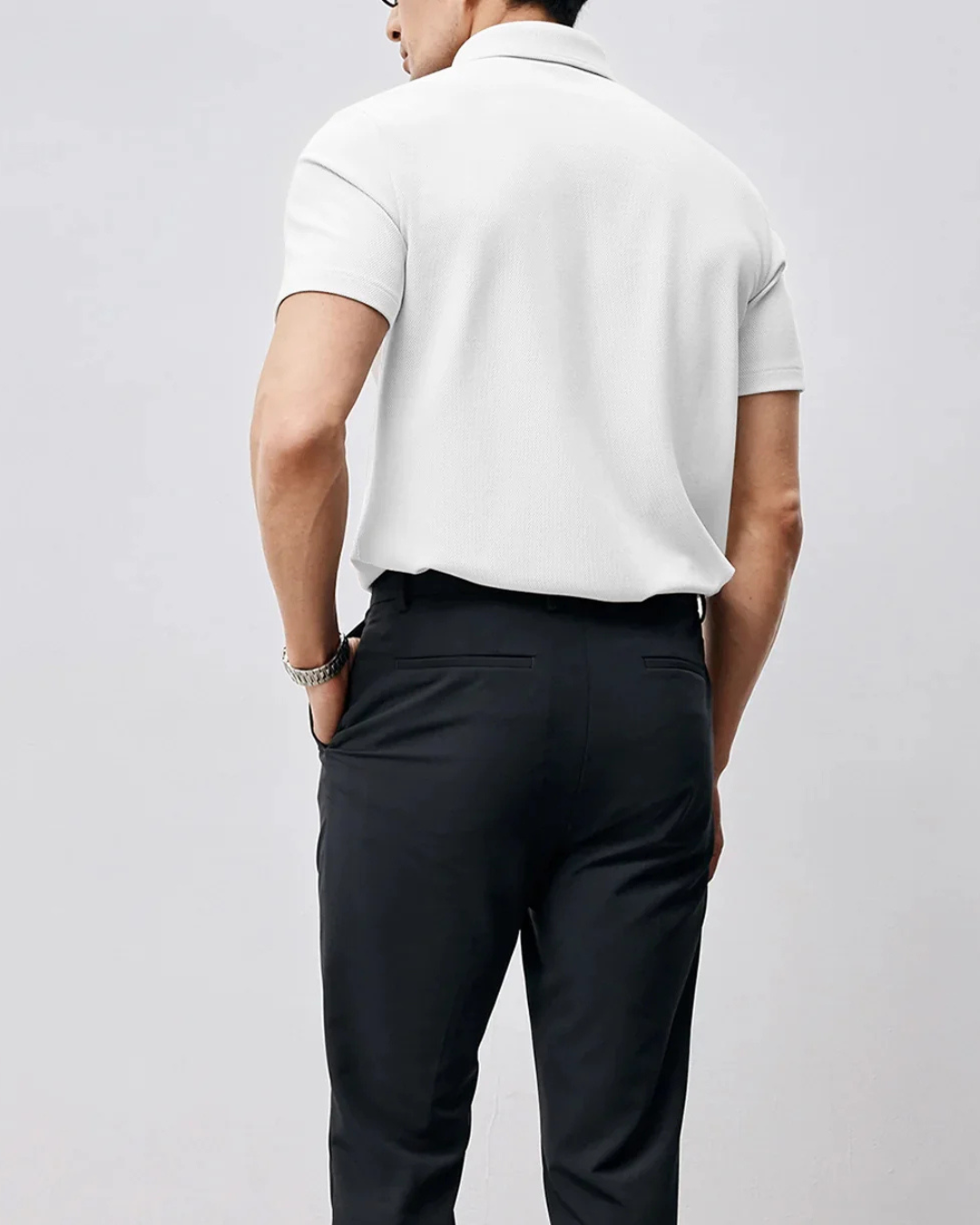 Polo de manga corta de tejido de poliéster transpirable para hombre