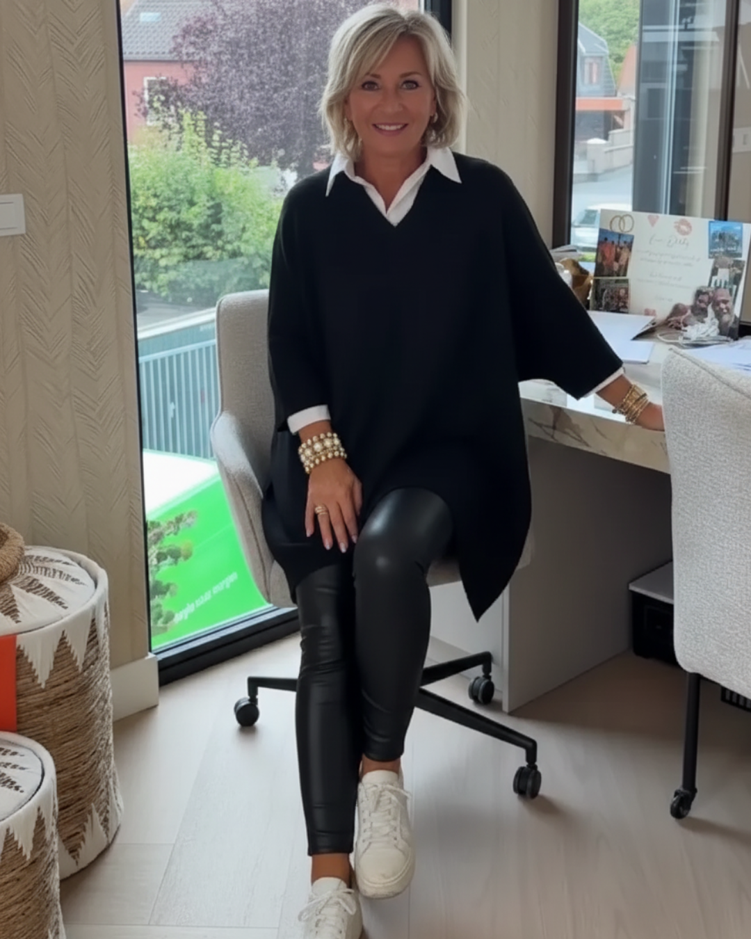Suéter casual con mangas decoradas y estilo holgado