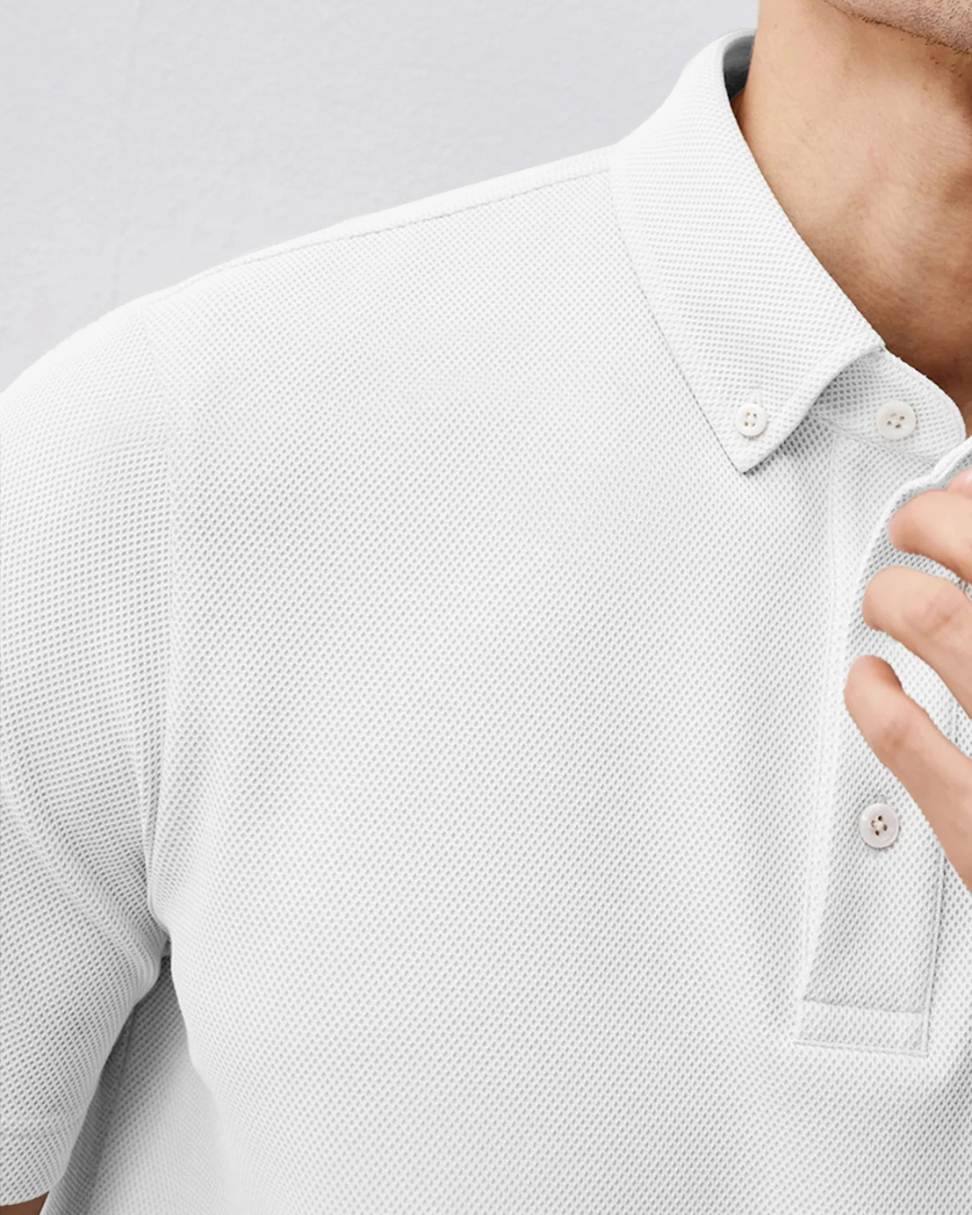 Polo de manga corta de tejido de poliéster transpirable para hombre