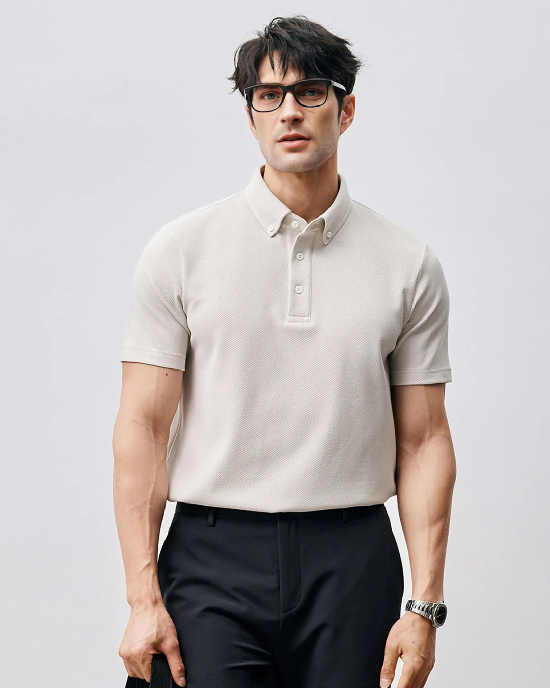 Polo de manga corta de tejido de poliéster transpirable para hombre