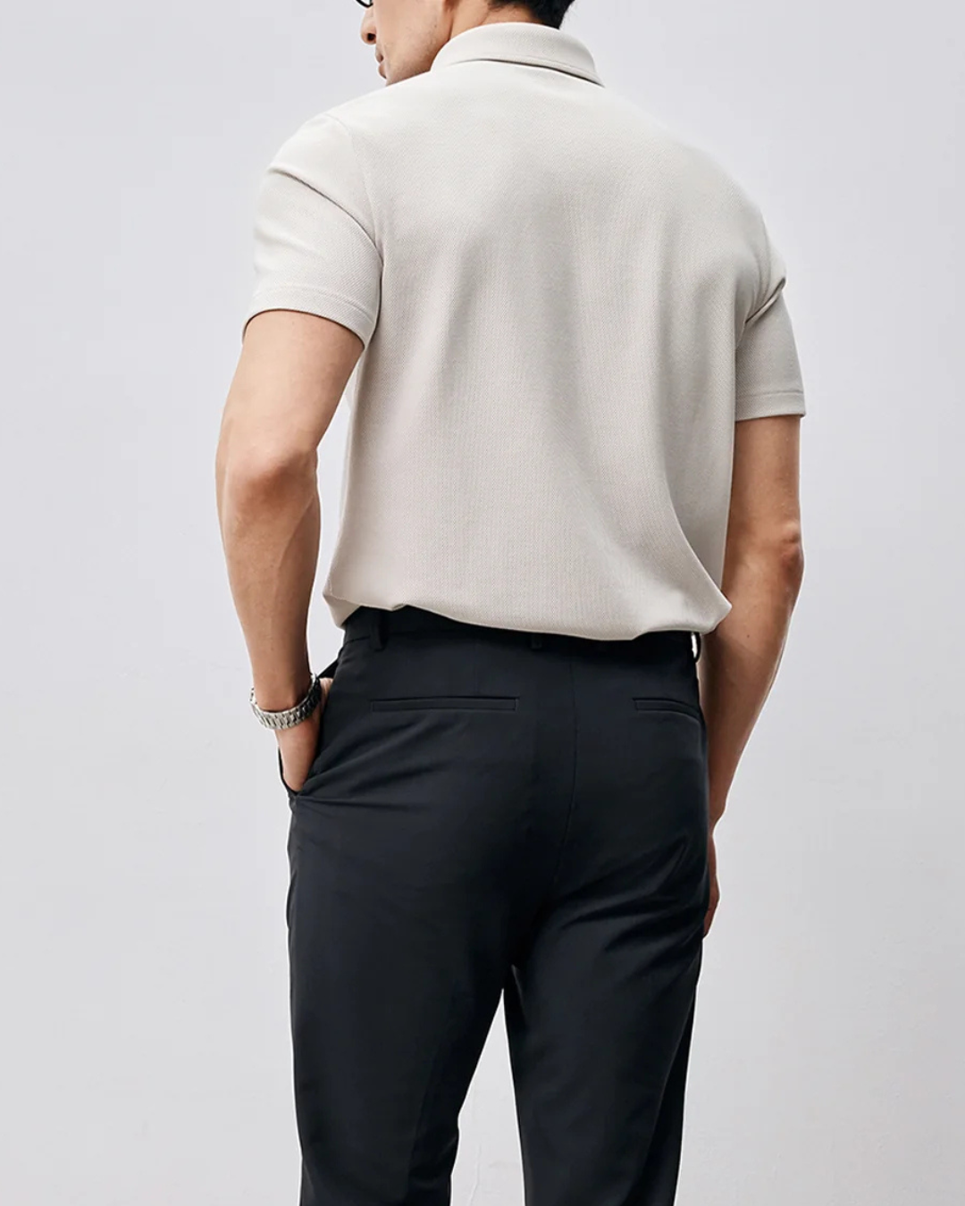 Polo de manga corta de tejido de poliéster transpirable para hombre