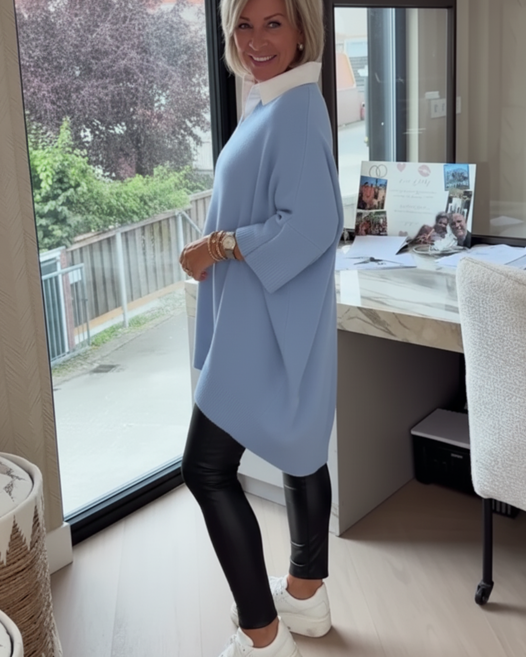 Suéter casual con mangas decoradas y estilo holgado