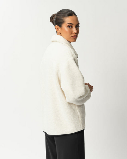 Abrigo de lana con cremallera frontal y cuello alto