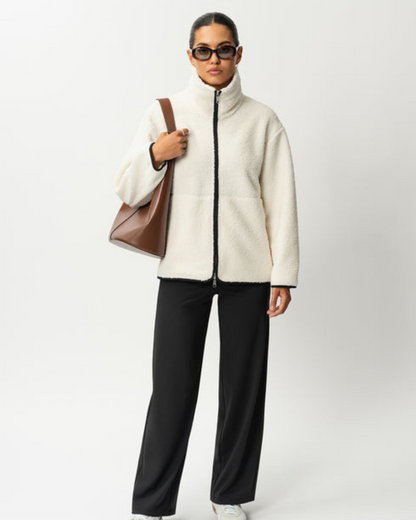 Abrigo de lana con cremallera frontal y cuello alto